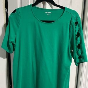 Green top with “ladder” sleeves.